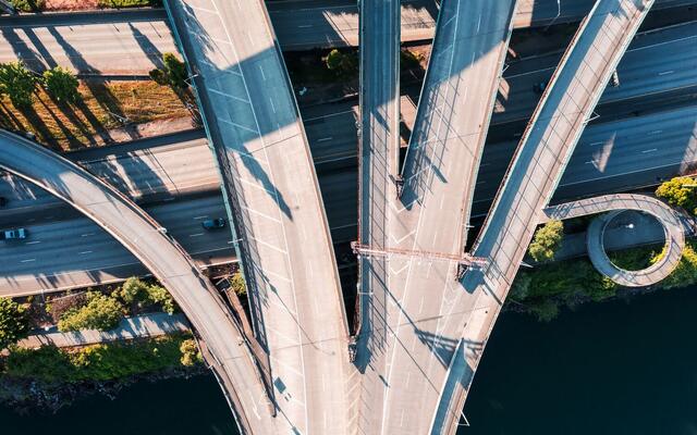 Aerial view of a highway interchange and its curving ramps