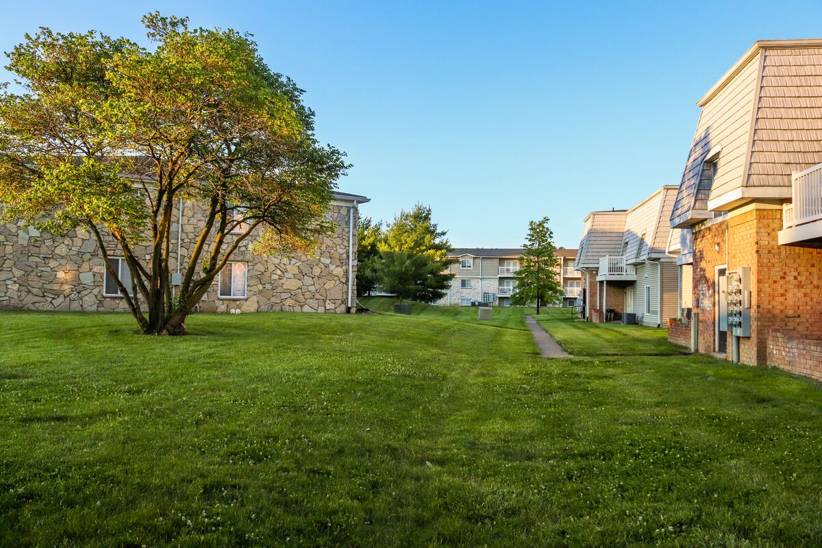 Garden apartment buildings set around an open lawn