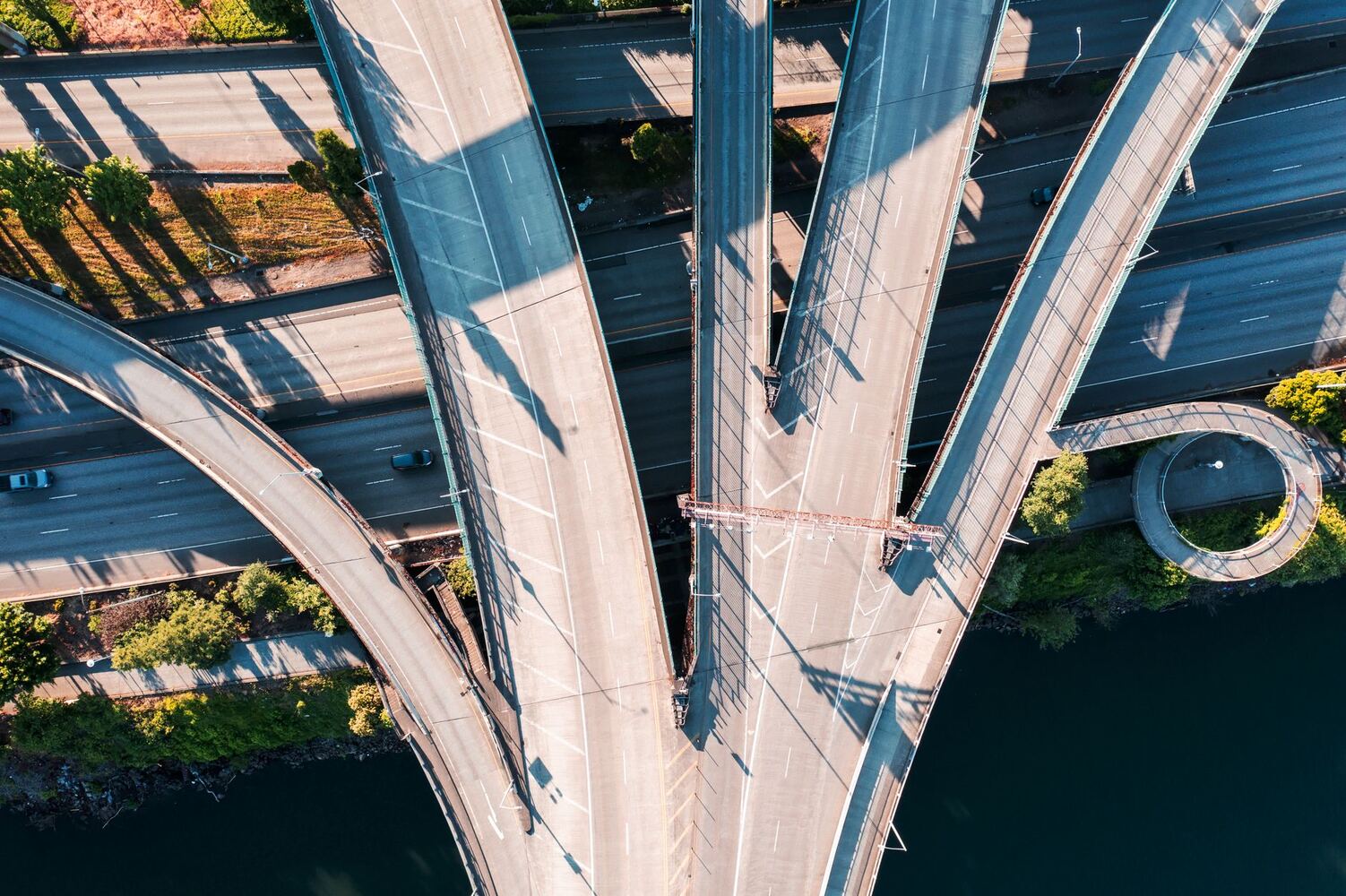 Aerial view of a highway interchange and its curving ramps